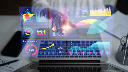 Dynamic data visualization displayed on computer screen, showcasing graphs and charts, perfect for business presentations, analysis, and productivity insights. Impute