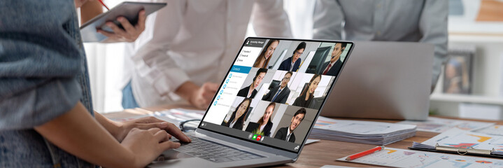 Business people on video conference for brisk virtual group meeting of corprate business office...