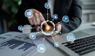 A business professional interacts with a digital interface, exploring innovative concepts and trends in data analysis within a modern workplace setting. Crux