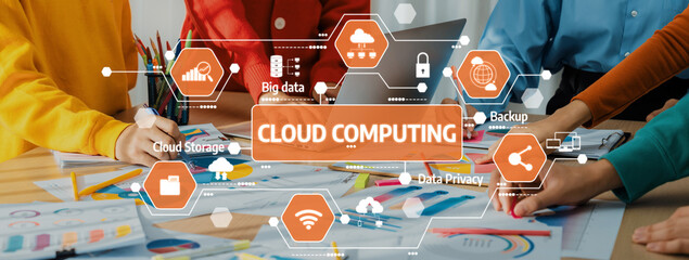 A vibrant team engages in brainstorming around cloud computing strategies, focusing on data privacy, backup solutions, and digital innovations at a modern workspace. Amity