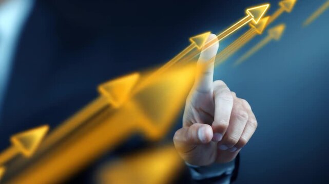 Businessmans hand touching glowing arrows pointing upward on blue