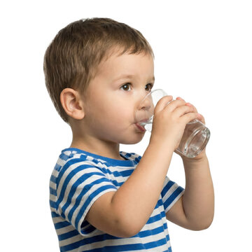 Young boy drinking water from a clear plastic bottle isolated on transparent background