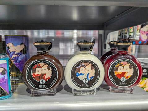 Canada, Quebec, 08 November 2025 : Three bottles of Shunga body painting displayed on a store shelf