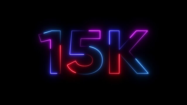 Neon lit 15 K text in pink blue and red on black background