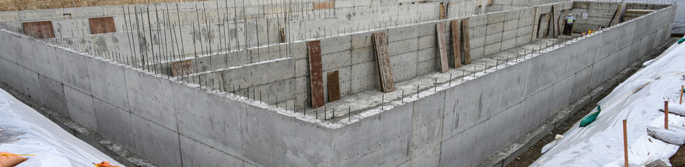 Large Stormwater Retention Tank project under construction, foundation dug and concrete poured,...