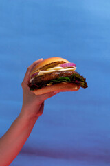Minimalist Food Photography: Burger and Blue Backdrop