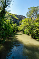 Rusenski Lom River Flowing Through Forested Canyon