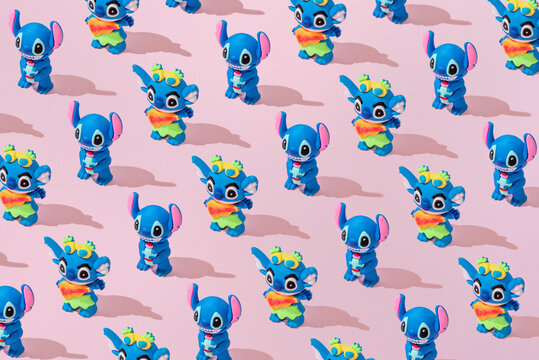 Bar, Montenegro, 1 December 2025, Stitch toy Pattern flat lay pink background
