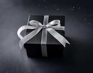 elegant black gift box with silver ribbon perfect for special occasions and celebrations