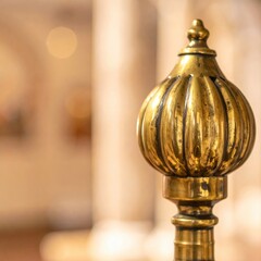 Ornate Golden Finial Detail on Blurred Architectural Background Soft Lighting Creates Elegant Ambiance