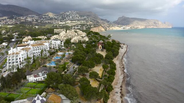 Apartments, luxury villas, and hotels on Playa de la Olla in Altea, Alicante, Spain. 