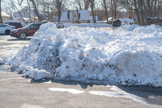 snow piles at parking lots