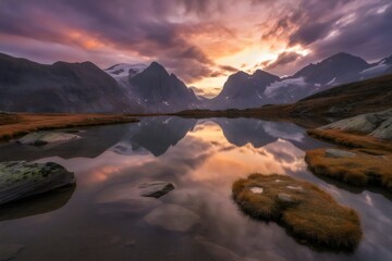 Serene mountain lake at sunset with calm water reflection