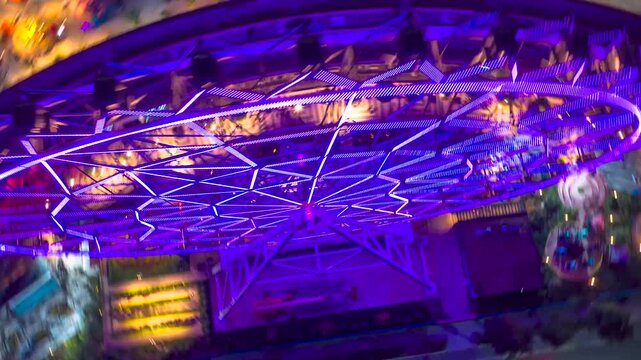 Night hyperlapse over Aztl&aacute;n Park in Chapultepec Forest, highlighting the illuminated Ferris wheel as city lights and traffic flow around Mexico City&rsquo;s urban core.