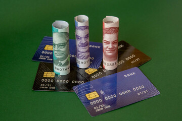 Minimum Wage Increase Concept with Banknotes and Credit Cards