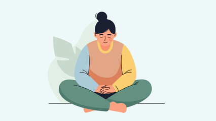 Woman in meditative pose with legs crossed and hands on knees, wearing brown and yellow top, green pants, and yellow necklace, on light green background