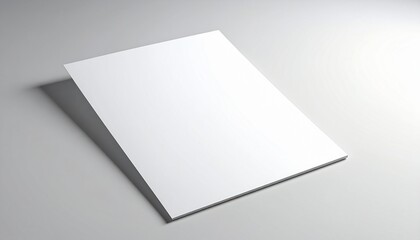 Blank white paper lying on a clean, minimalist surface, casting a subtle shadow, perfect for design mockups and branding