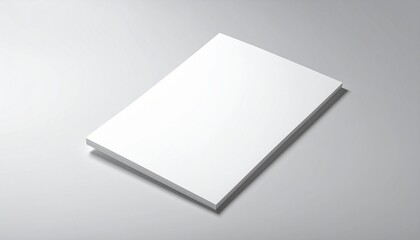 Blank White Book Cover on a Gray Surface Mockup for Design and Branding Purposes