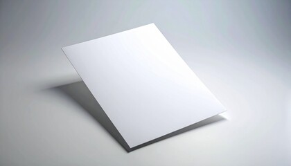 Blank White Paper Card Isolated on Gray Background with Subtle Shadow and Highlight for Mockup or Design Presentation