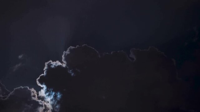 Beautiful 4K timelapse showing clouds moving rapidly from above, with sunlight and sky creating a dynamic aerial view.