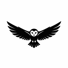 Obraz premium Black Silhouette Owl Flying with Spread Wings.