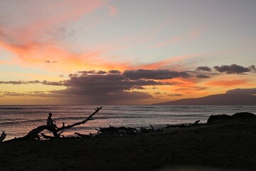 The sun sets on the Hawaiian island of Maui