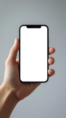 Hand holding smartphone with empty screen for advertisement mockup, clean and minimalist background, realistic lighting, commercial friendly stock image