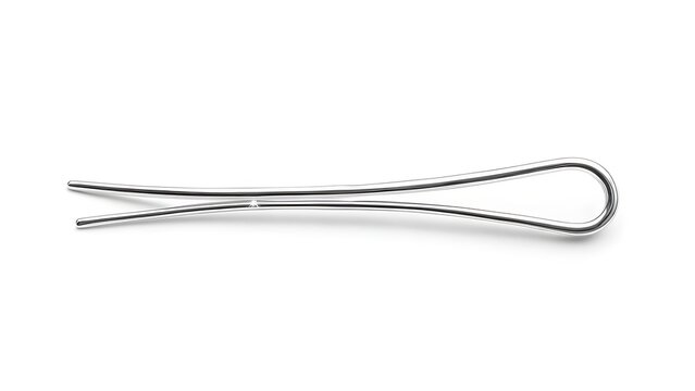 A single, thin, silver-colored hairpin rests on a bright white surface. It is curved and bent at one end, with a forked end