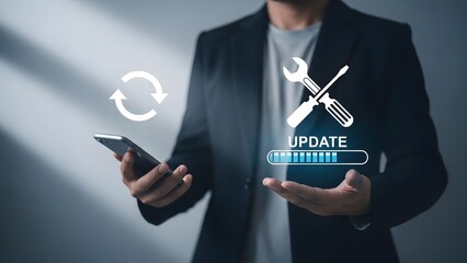 Businessman holding smartphone with update and tools icon