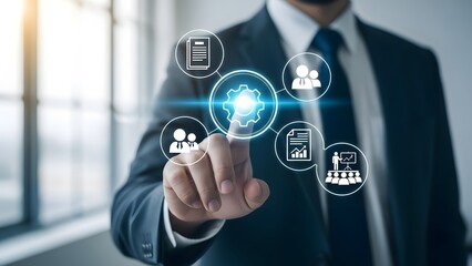 Businessman interacting with digital interface icons