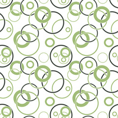 green and black rings and circles on white