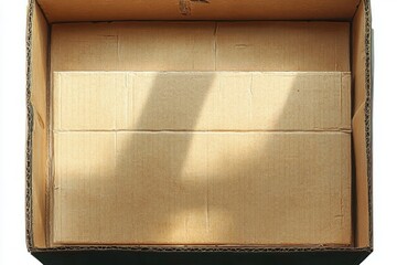 open corrugated cardboard box with nested insert and diagonal sunlight casting soft shadow over empty brown interior, evoking calm minimalism and quiet anticipation