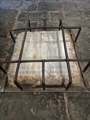 Rome, Italy &ndash; 14 January 2025. Faint footprints in marble, traditionally linked to Jesus, are preserved in a barred display at the Church of Domine Quo Vadis on a stone floor.
