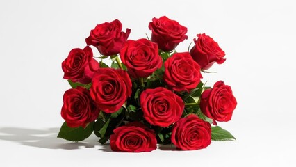 Obraz premium Elegant bouquet featuring vibrant crimson roses on a crisp white background display