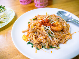 Pad Thai Shrimp: Thai Fried Noodles Prawn Stir-fry Street Food White Plate Close-up Detail