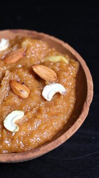 Moong dal halwa is a classic Indian sweet dish made with moong lentils, sugar, ghee and cardamom powder