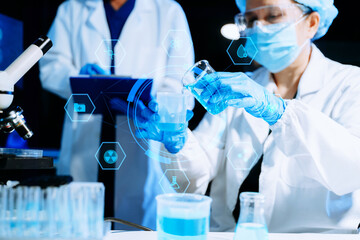 Medical scientists using digital technology and AI tools for laboratory research and diagnostics. Healthcare innovation, biotechnology, data-driven medicine