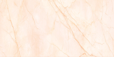 A close up view of a light peach colored marble texture with subtle veining and warm tones