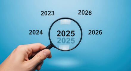 Future Forecast Planning and Strategy. Magnifying Glass Focusing on 2025 Year. Concept of Focus and Target in Business Goal.