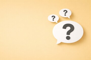 Question Mark Chat Bubbles on Yellow Background