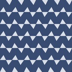 Colorful, seamless geometric triangle pattern for decorative wallpaper and fabric design