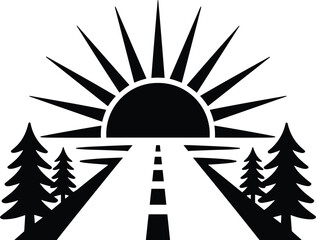 Sunrise over a forest with a road in the middle trees