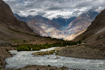 Glacial River Flowing Through a Remote Mountain Valley in Gilgit Baltistan, Pakistan