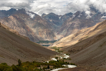Winding River Cutting Through a Majestic Mountain Valley in Gilgit Baltistan