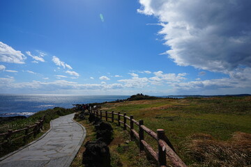 fine seaside walkway and charming clouds
