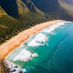 Aerial view of a stunning beach with turquoise water, sandy shore, and lush green mountains in the background