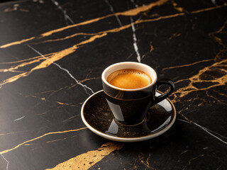 Espresso Cup on Elegant Black Marble Countertop