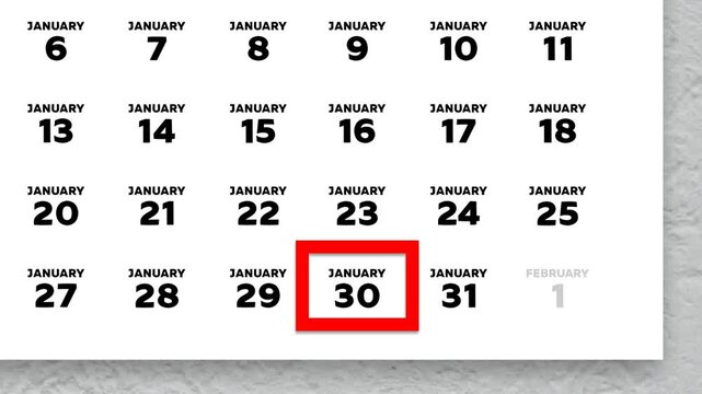 The date January 30th marked with a red cursor on the wall calendar 2026