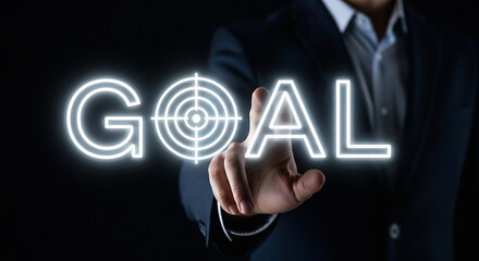 Person in suit pointing at glowing goal text with target symbol on letter O finger