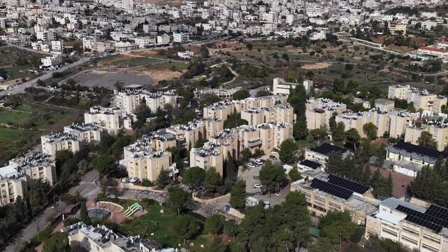 Aerial Kiryat Arba Neighborhood Israel

Drone footage of residential blocks, streets, and green areas in Kiryat Arba, November 2025, Israel
